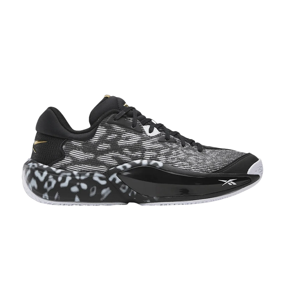 Krossovki-Reebok-Engine-A-26-Black-White-Gold