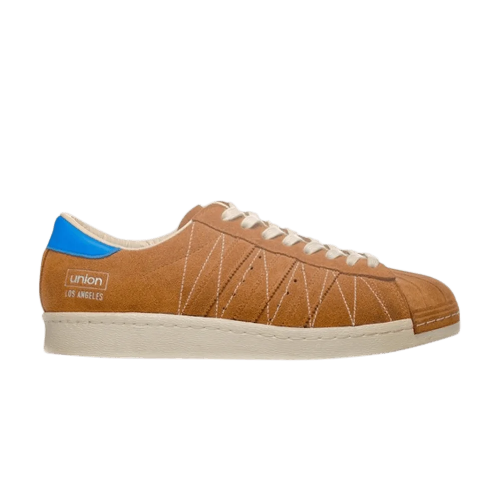 Krossovki-Union-x-adidas-Superstar-80v-Timber