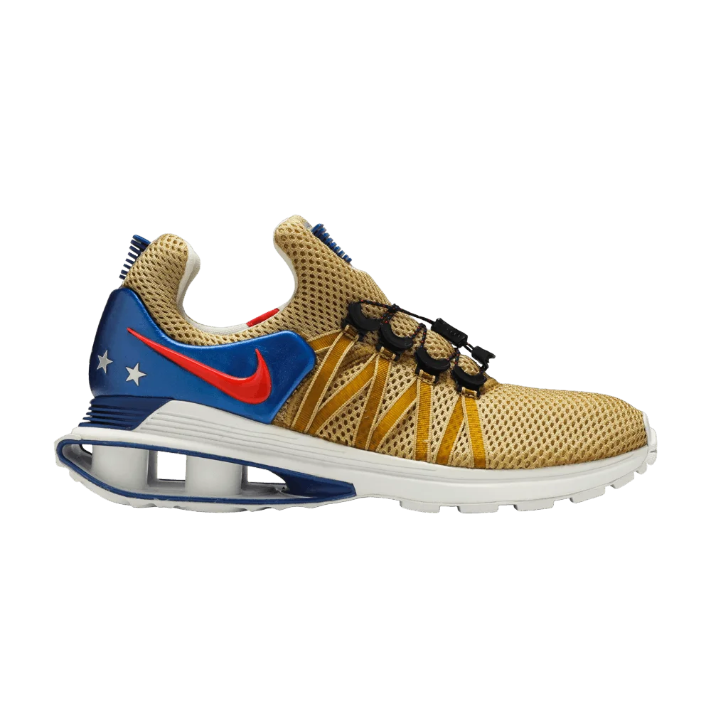 Krossovki-Nike-Shox-Gravity-Metallic-Gold