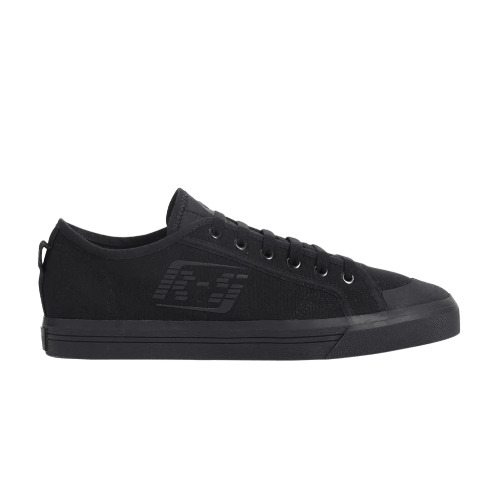 Krossovki-Raf-Simons-x-adidas-Spirit-Low-Assym-Tongue-1