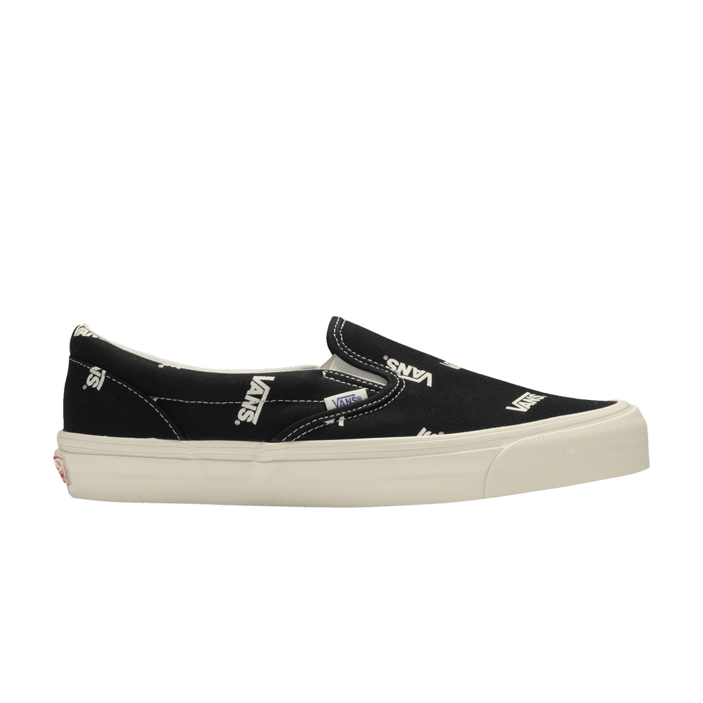 classic-slip-on-lx-canvas-multi-logo-black-vn0a45jkvqe