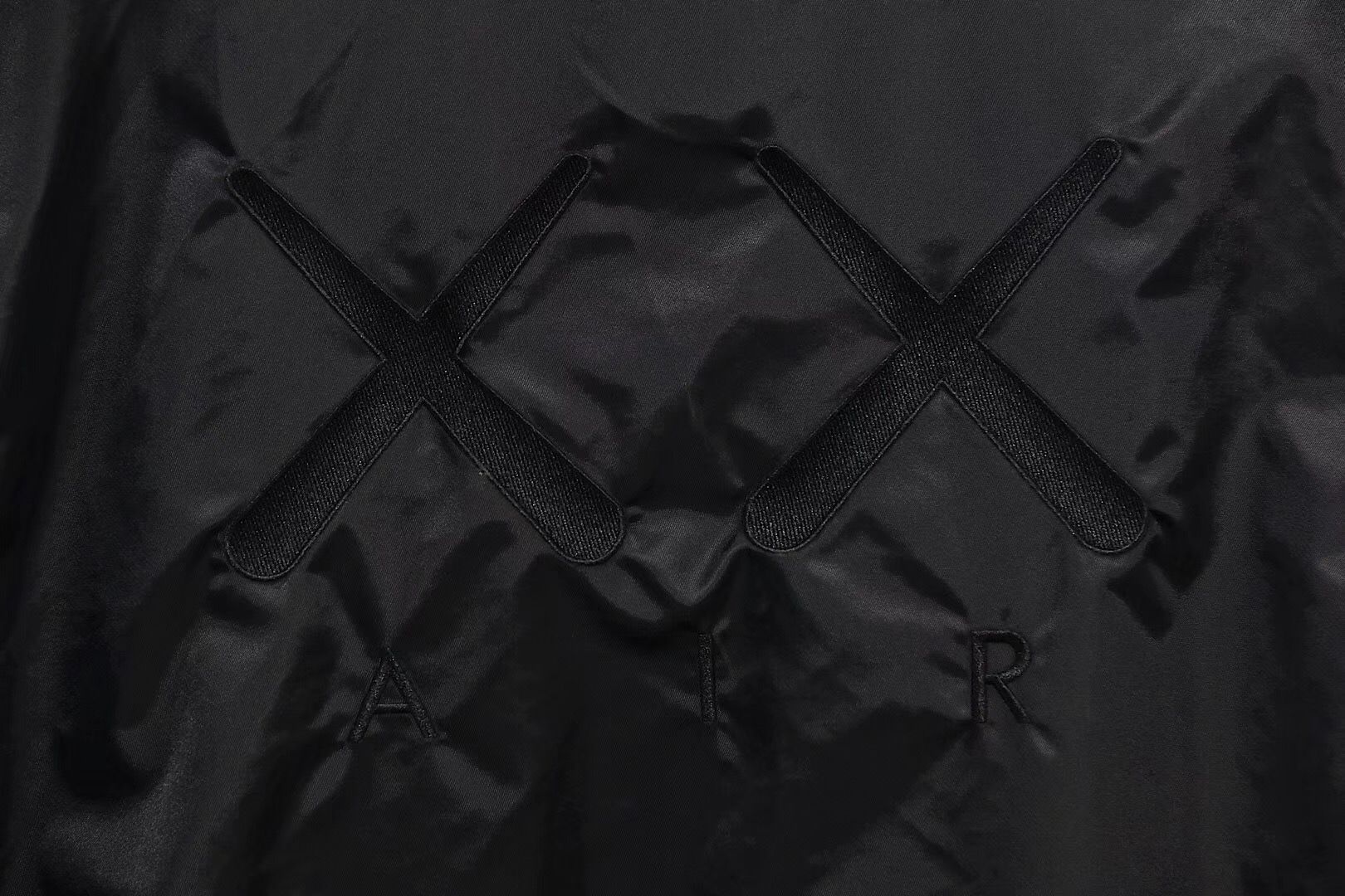 KAWS-x-Jordan-Satin-Coaches-Jacket-Black-8