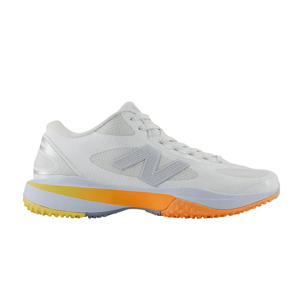 Кроссовки New Balance FreezeLX v5 Turf 'Ice Blue Hot Mango'