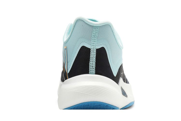 Кроссовки New Balance FuelCell Rebel v2 'Black Pale Blue'