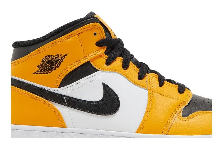 Krossovki-Air-Jordan-1-Mid-GS-Reverse-Yellow-Toe-1