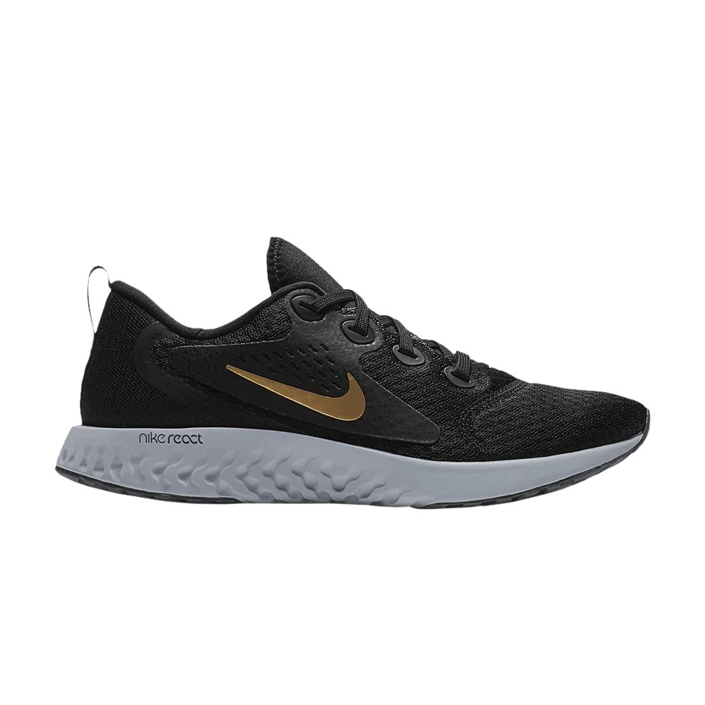 Krossovki-Nike-Wmns-Legend-React-Black-Metallic-Gold