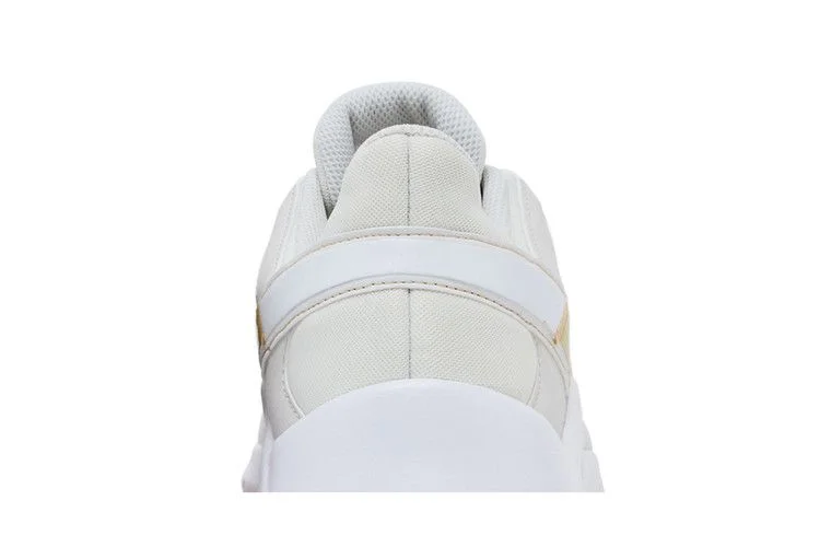 Krossovki-Nike-Wmns-Legend-Essential-2-Platinum-Tint-Metallic-Gold-Star-6