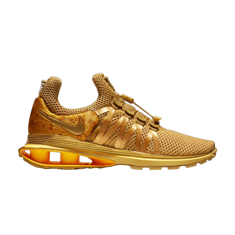 Кроссовки Nike Wmns Shox Gravity 'Metallic Gold'