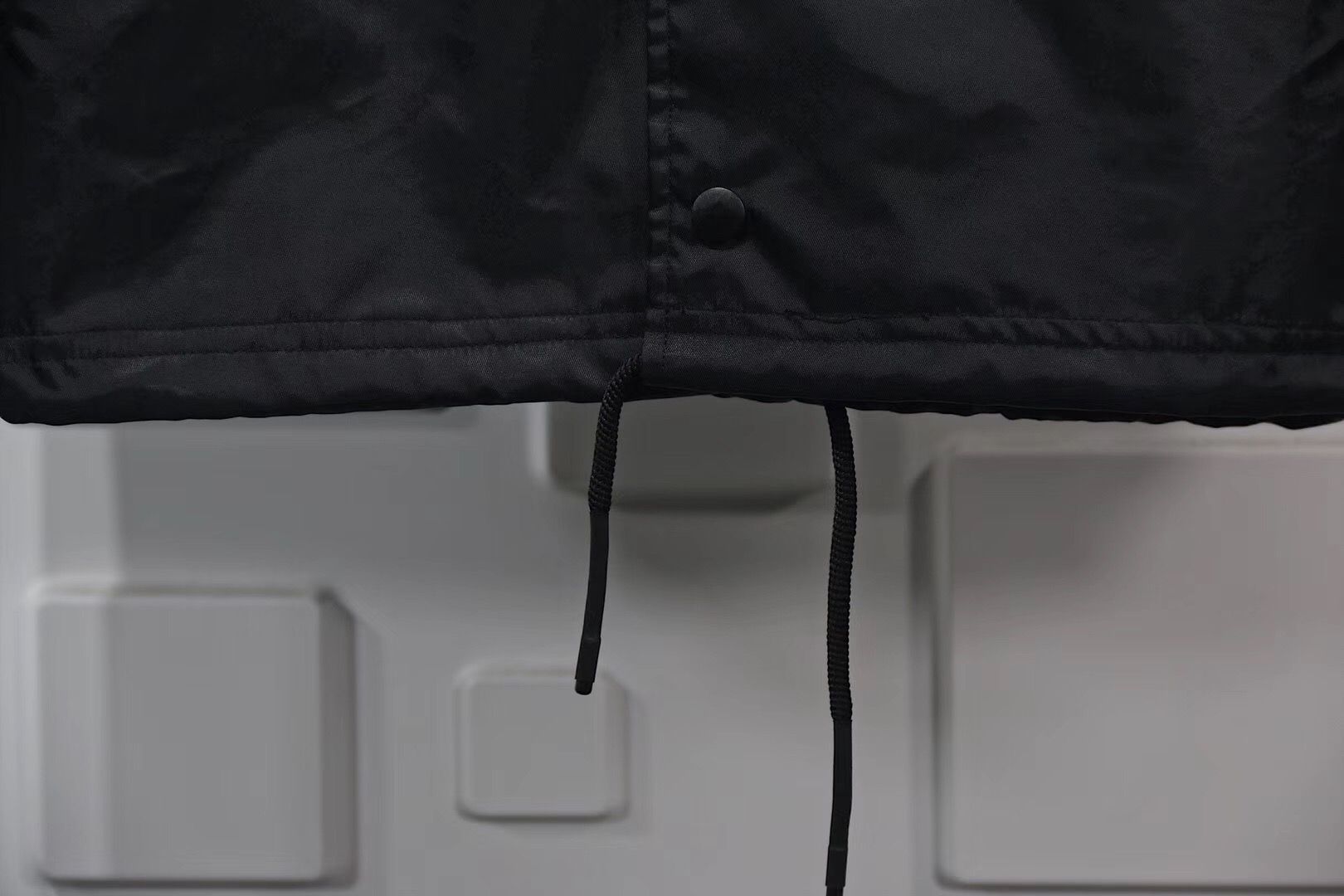 KAWS-x-Jordan-Satin-Coaches-Jacket-Black-9