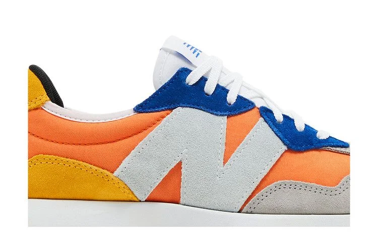 Krossovki-Dejounte-Murray-x-New-Balance-Wmns-327-Heat-Up-Orange-1