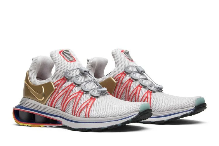 Кроссовки Nike Shox Gravity 'Metallic Gold' 2018