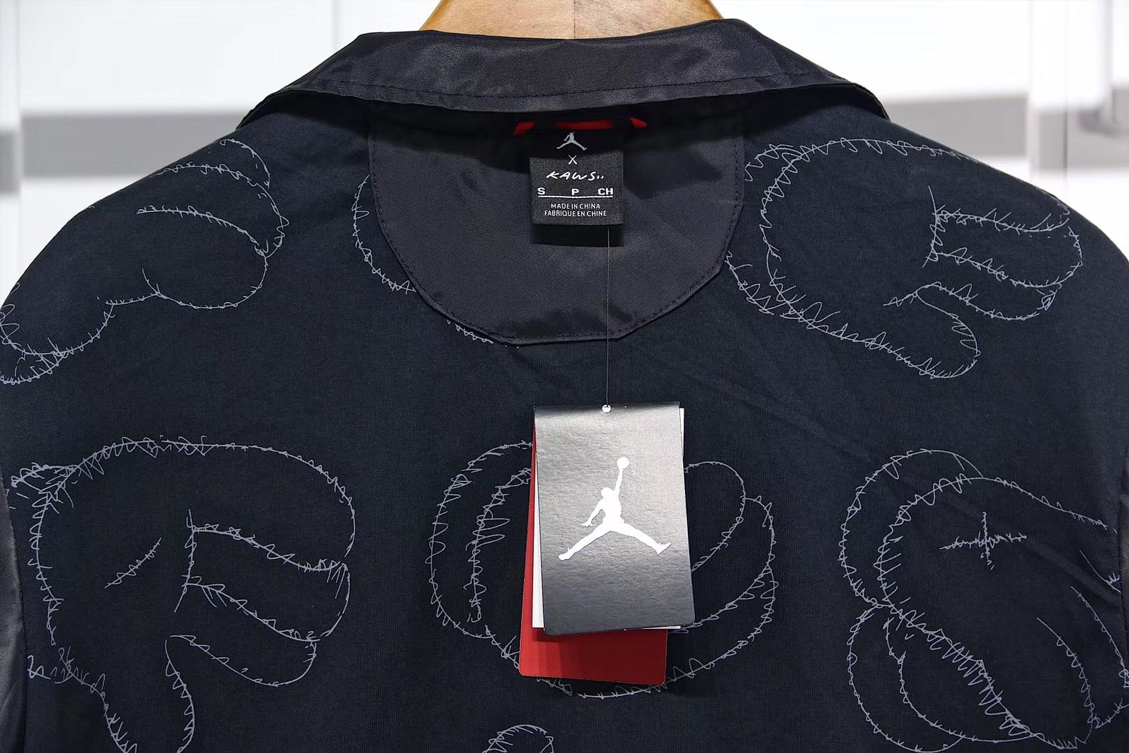 KAWS-x-Jordan-Satin-Coaches-Jacket-Black-7