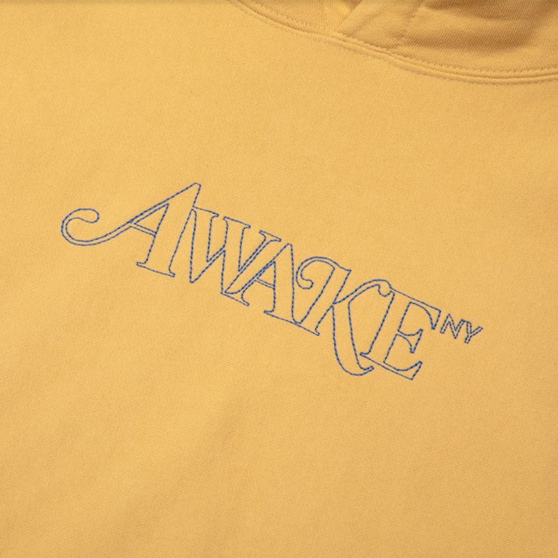 Awake-Classic-Outline-Logo-Paneled-Embroidered-Hoodie-Mustard-1