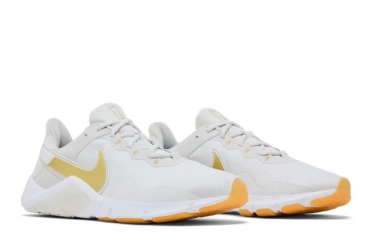 Krossovki-Nike-Wmns-Legend-Essential-2-Platinum-Tint-Metallic-Gold-Star-7