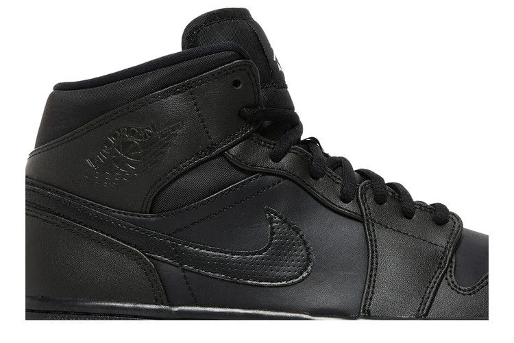 Krossovki-Air-Jordan-1-Mid-Black-White-1