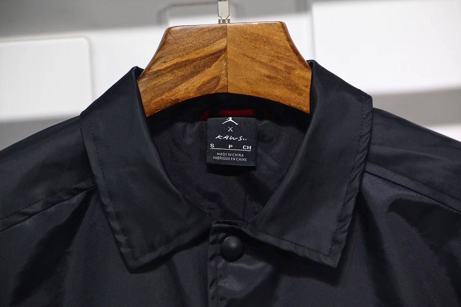 KAWS-x-Jordan-Satin-Coaches-Jacket-Black-4