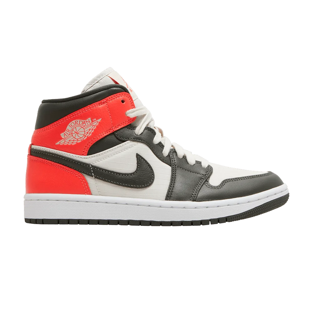 Krossovki-Wmns-Air-Jordan-1-Mid-SE-Newsprint